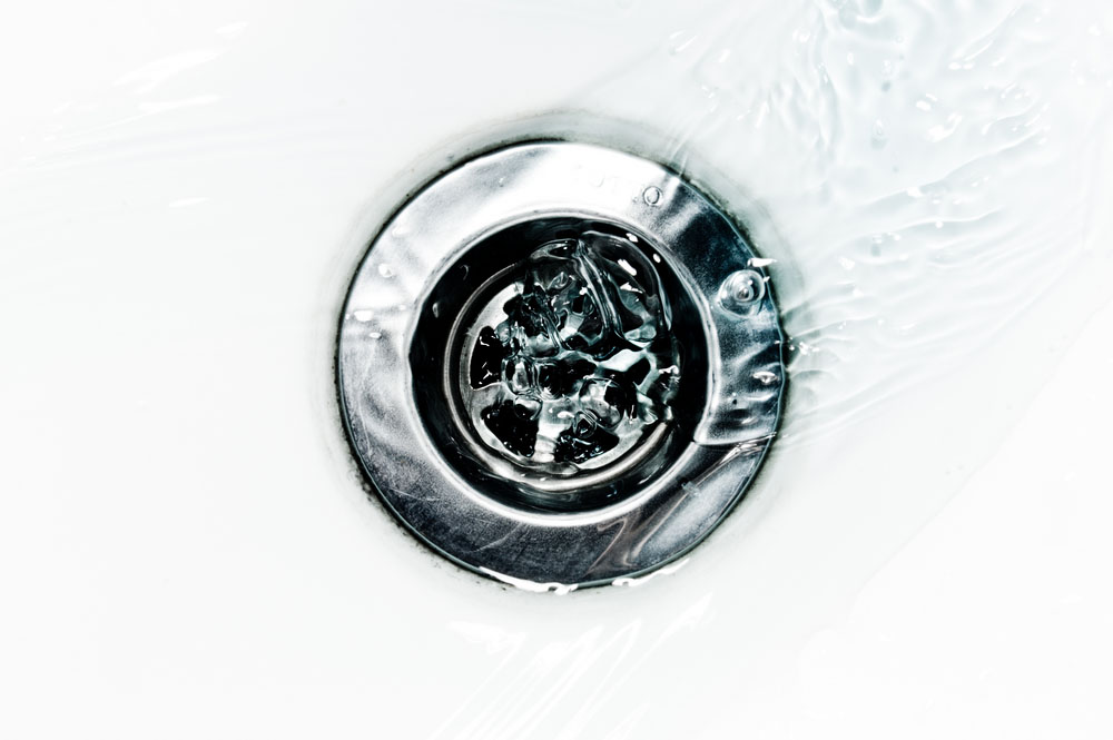 water flowing down the drain