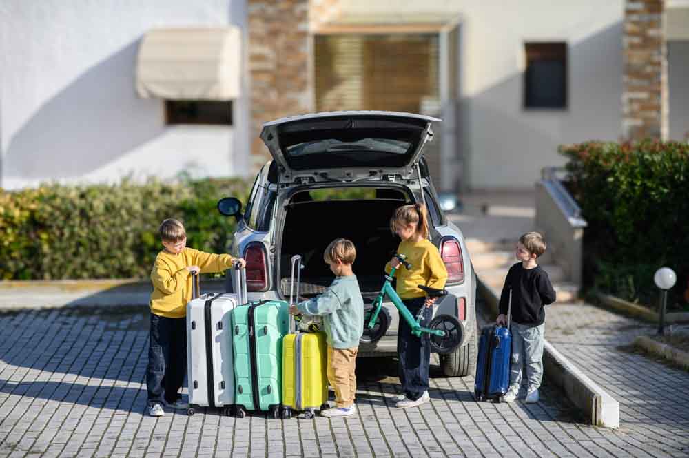 a family loading a car for a vacation