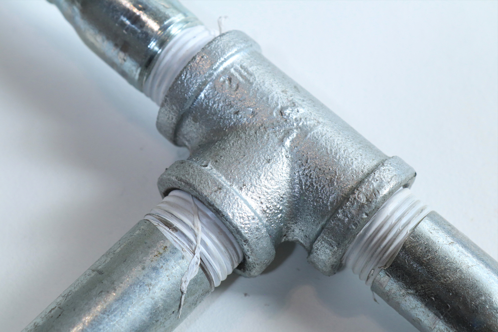Galvanized T joint pipe.